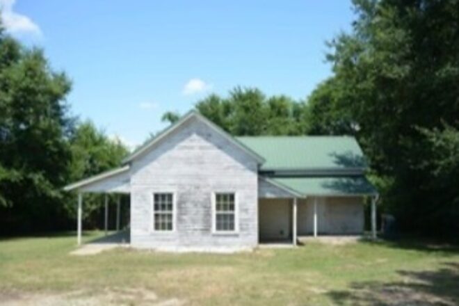 Sold white farmhouse with a covered porch and green metal roof at 3327 York Street in Sharon, South Carolina