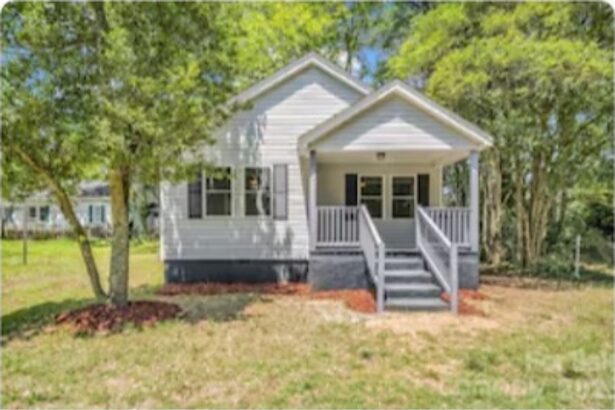Renovated cottage with a covered front porch at 908 West Graham Street in Shelby, North Carolina